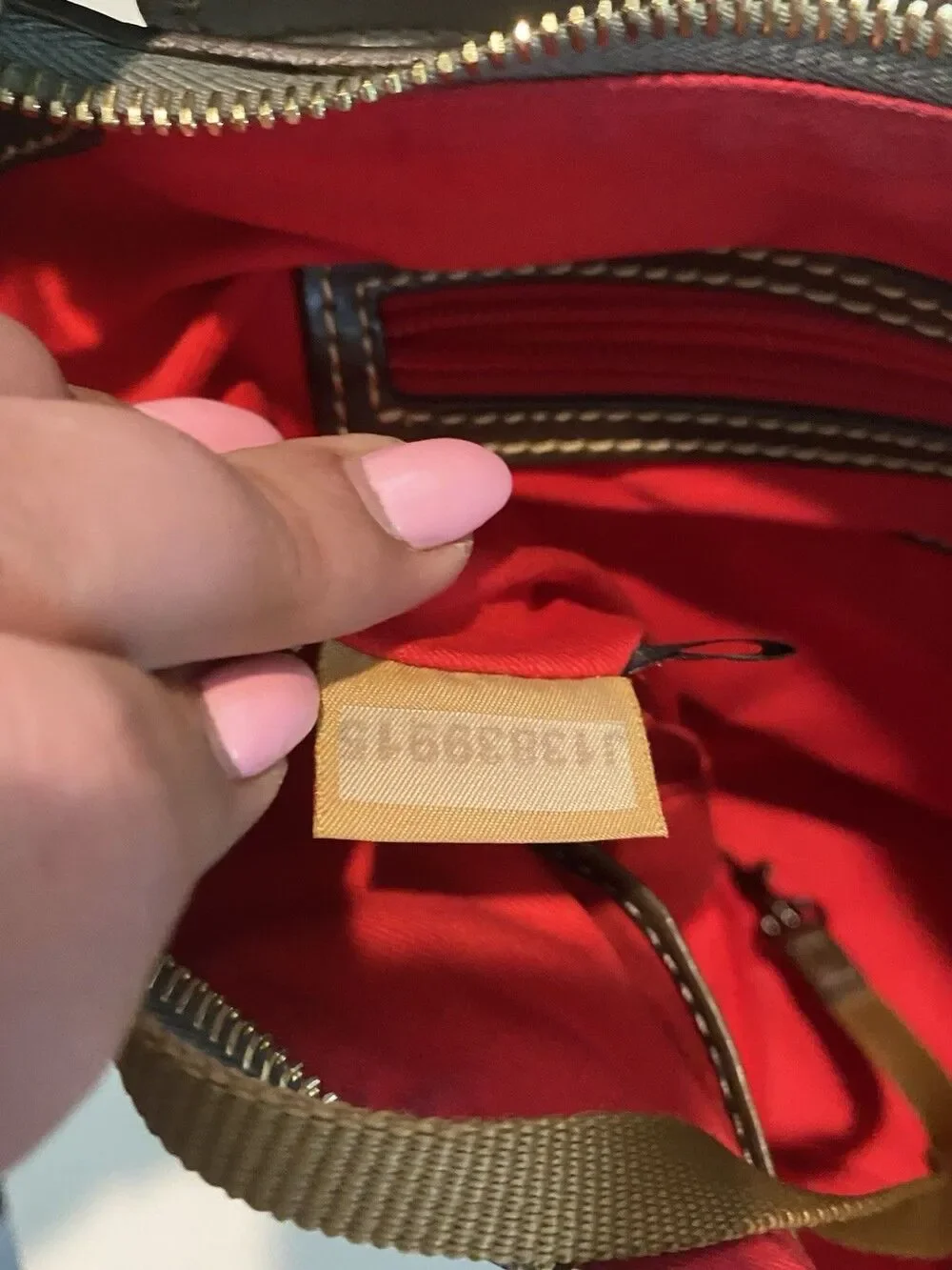 Dooney & Bourke Ostrich Hobo In Bone And Brown